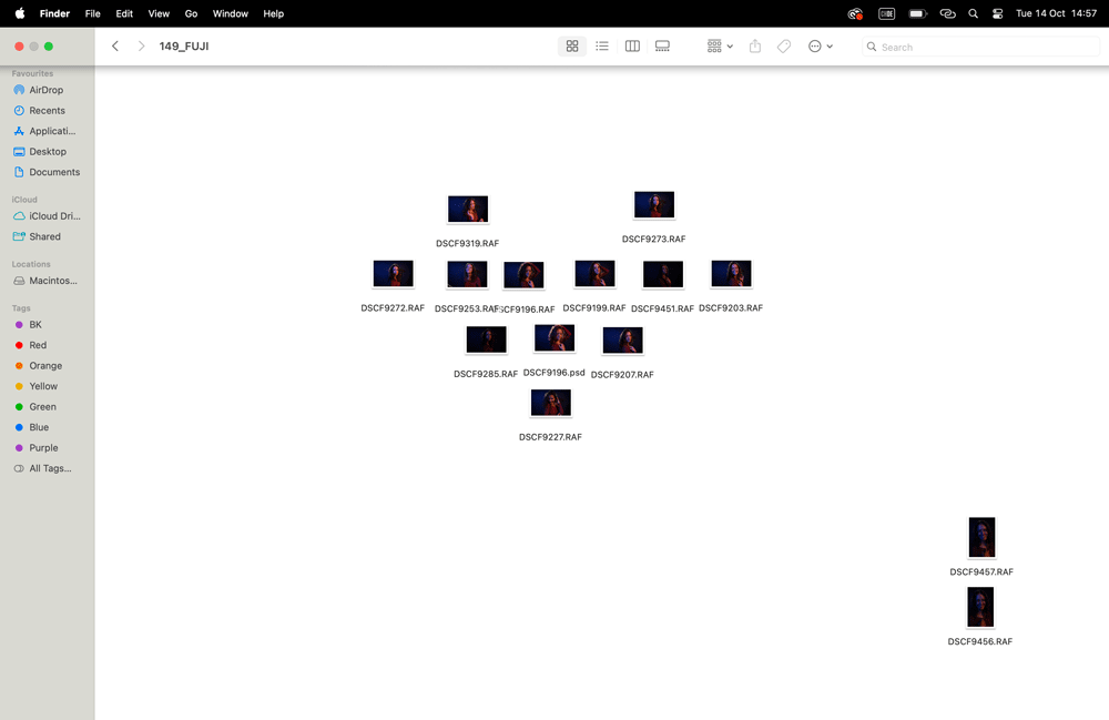 Screenshot of a computer folder showing image files arranged in a heart pattern, representing part of a creative workflow.